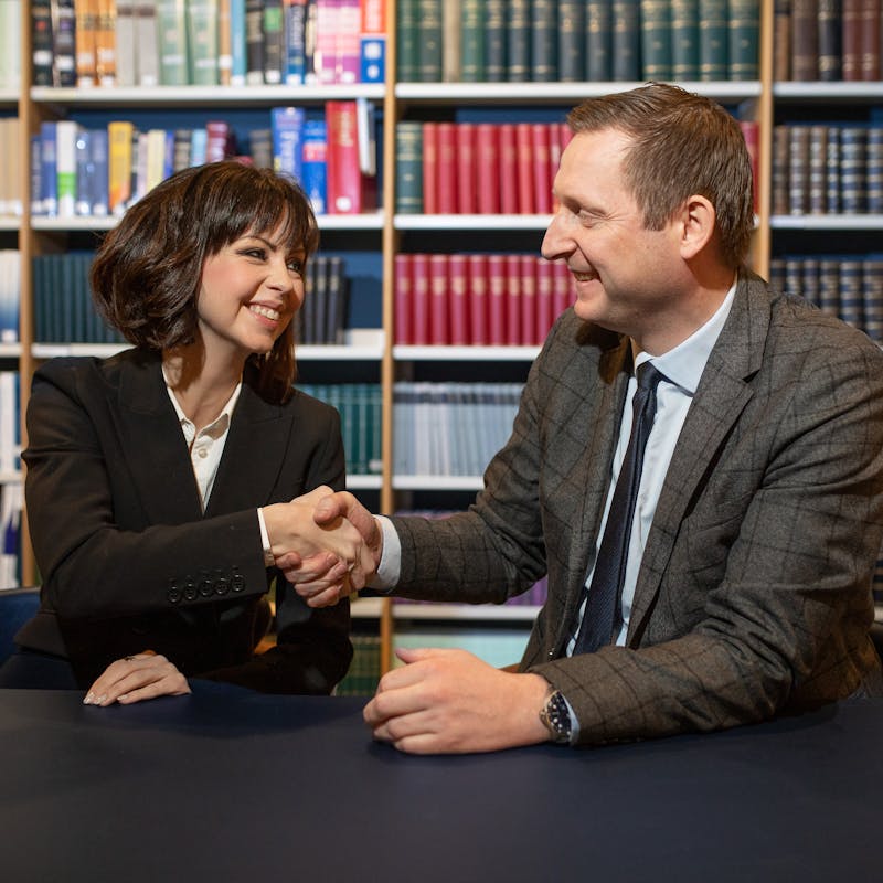 A photo of Margrét Anna Einasdóttir, founder and CEO at Justikal, and Benedikt Egill Árnason, managing partner at LOGOS