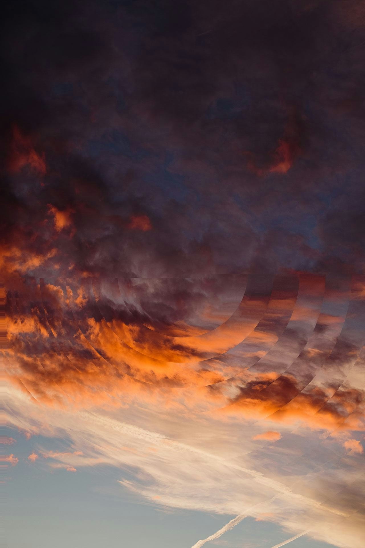 Inspiring orange sunset with an optical ripple effect.