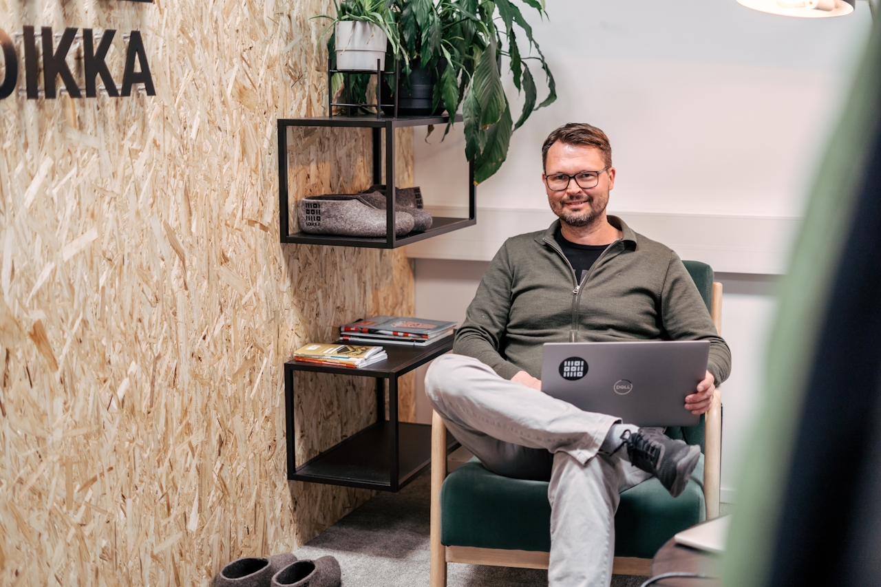 Tomas Haltsonen sitting on a chair at Loikka's office