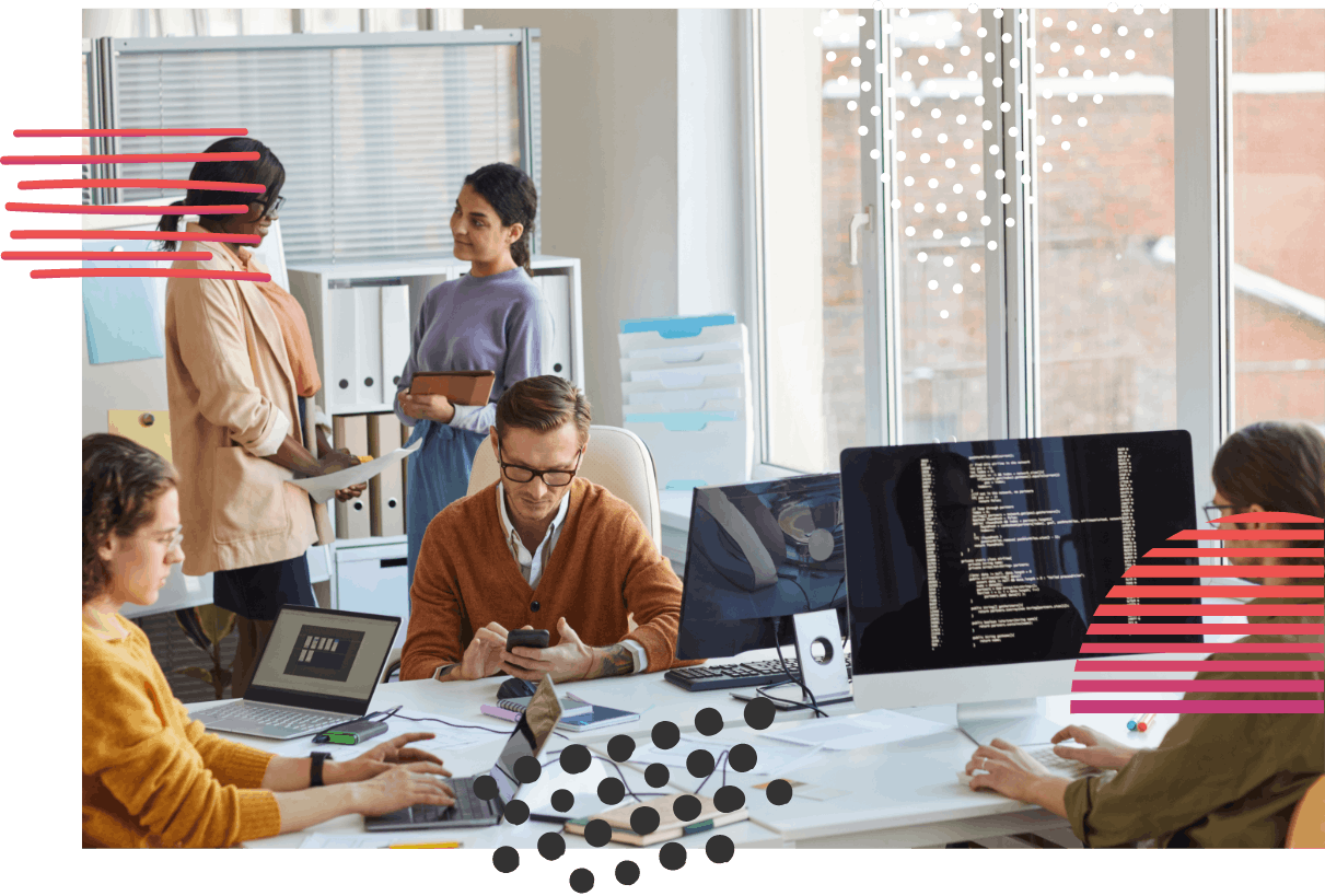 5 people in a bright office working on computers and software