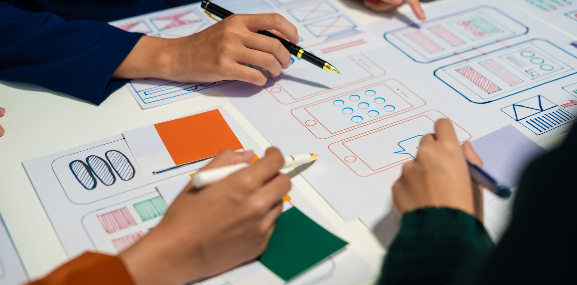 team finalizing design sprint prototype for testing with users