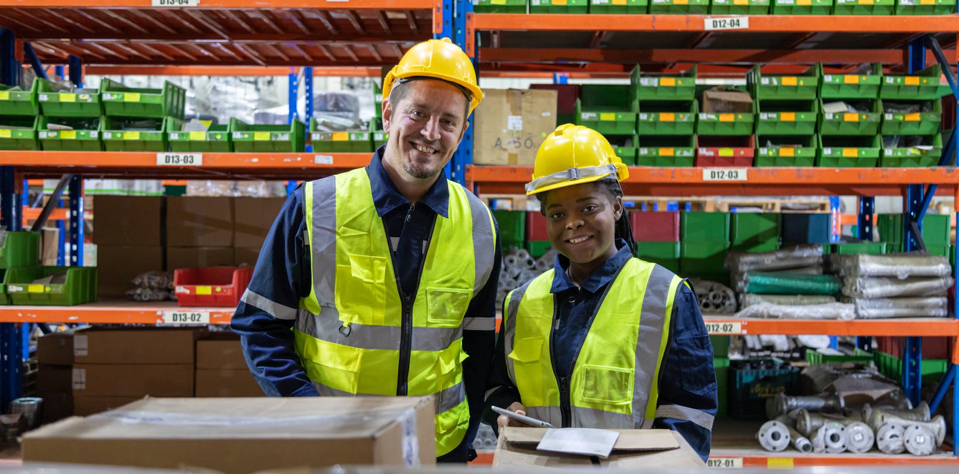 Two warehouse team members fulfilling a distribution order