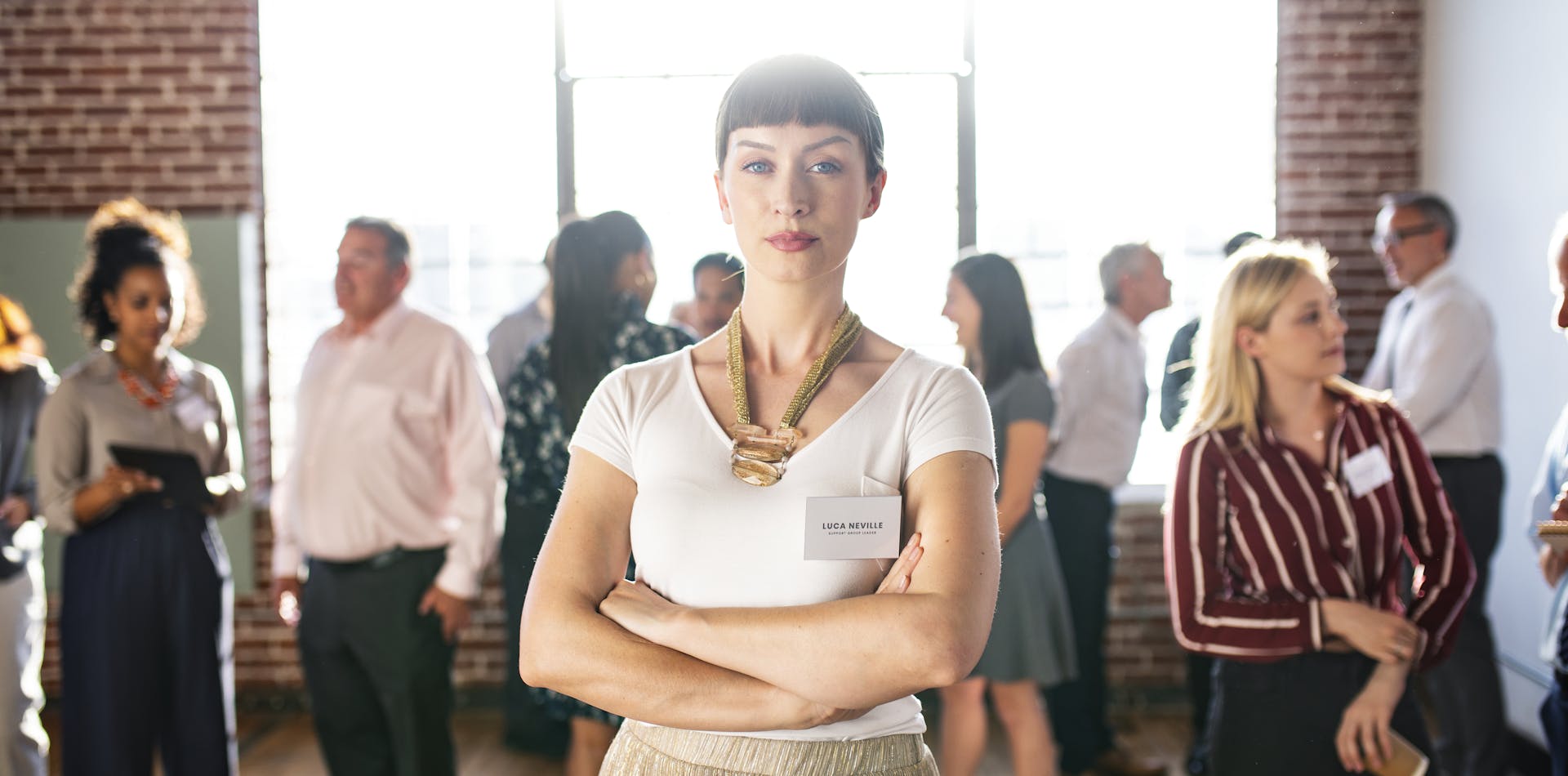 Woman with nametag not eager to engage with new people