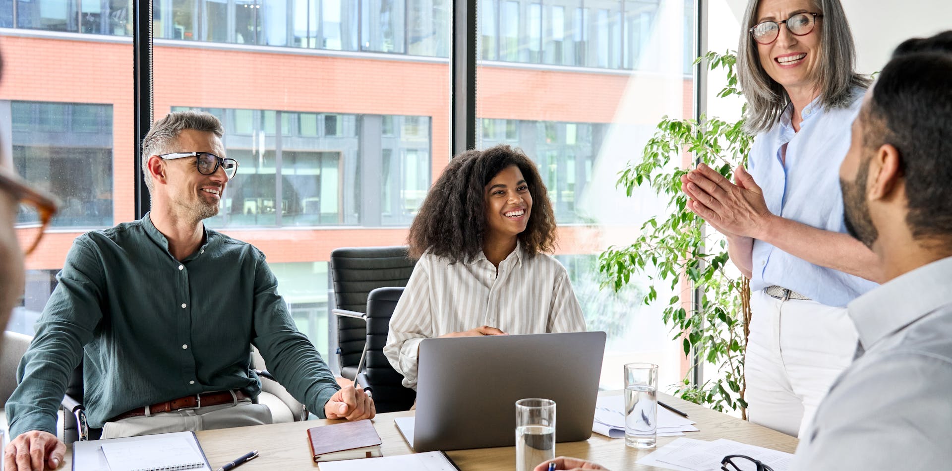 Group of co-workers in a meeting to start an AI taskforce