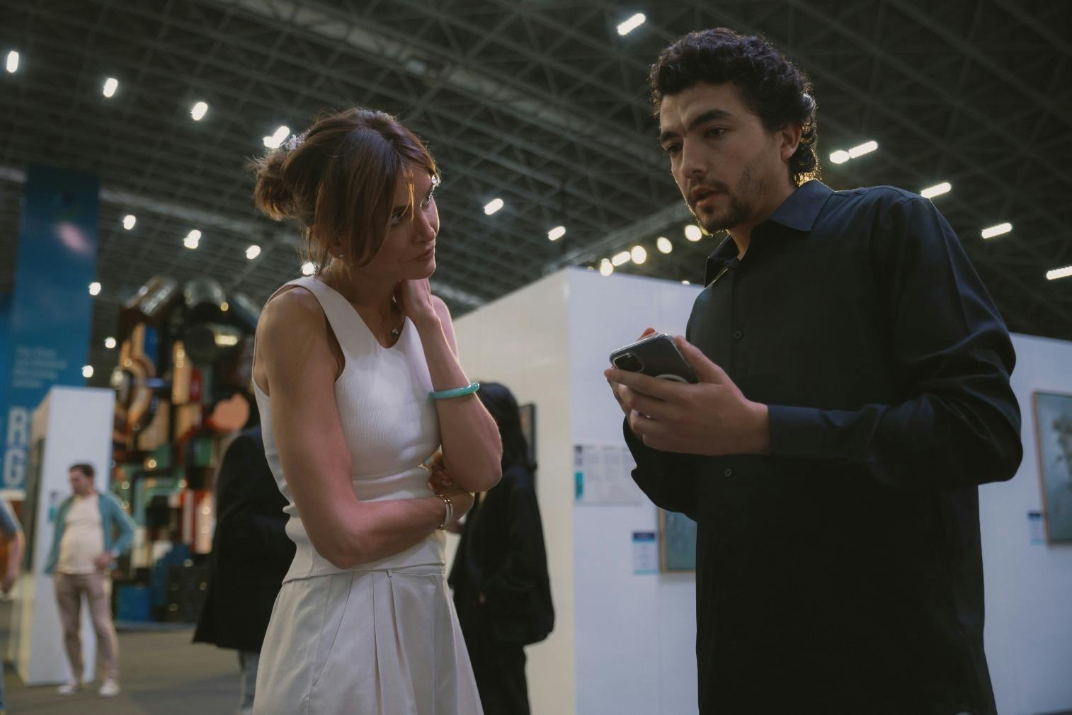 Lola Tillyaeva in discussion with art festival participant Jahongir Bobokulov