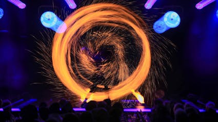 Fireshow with burning circle. 