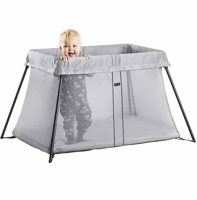 Baby using the BabyBjörn Travel Crib