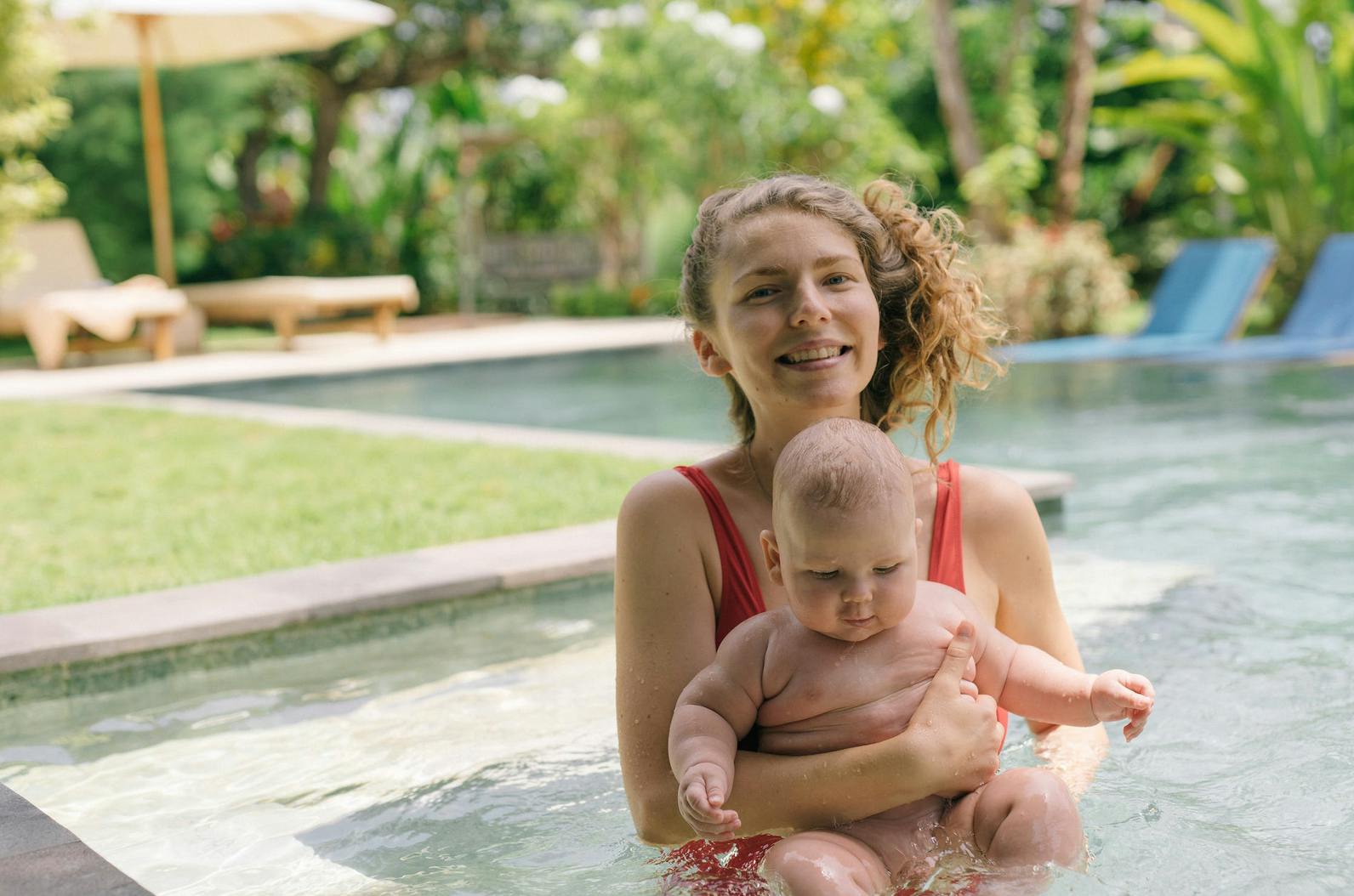 mom and baby doing a swimming lesson