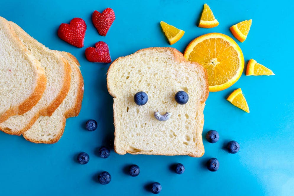 toast, blueberries, strawberries, and orange slices