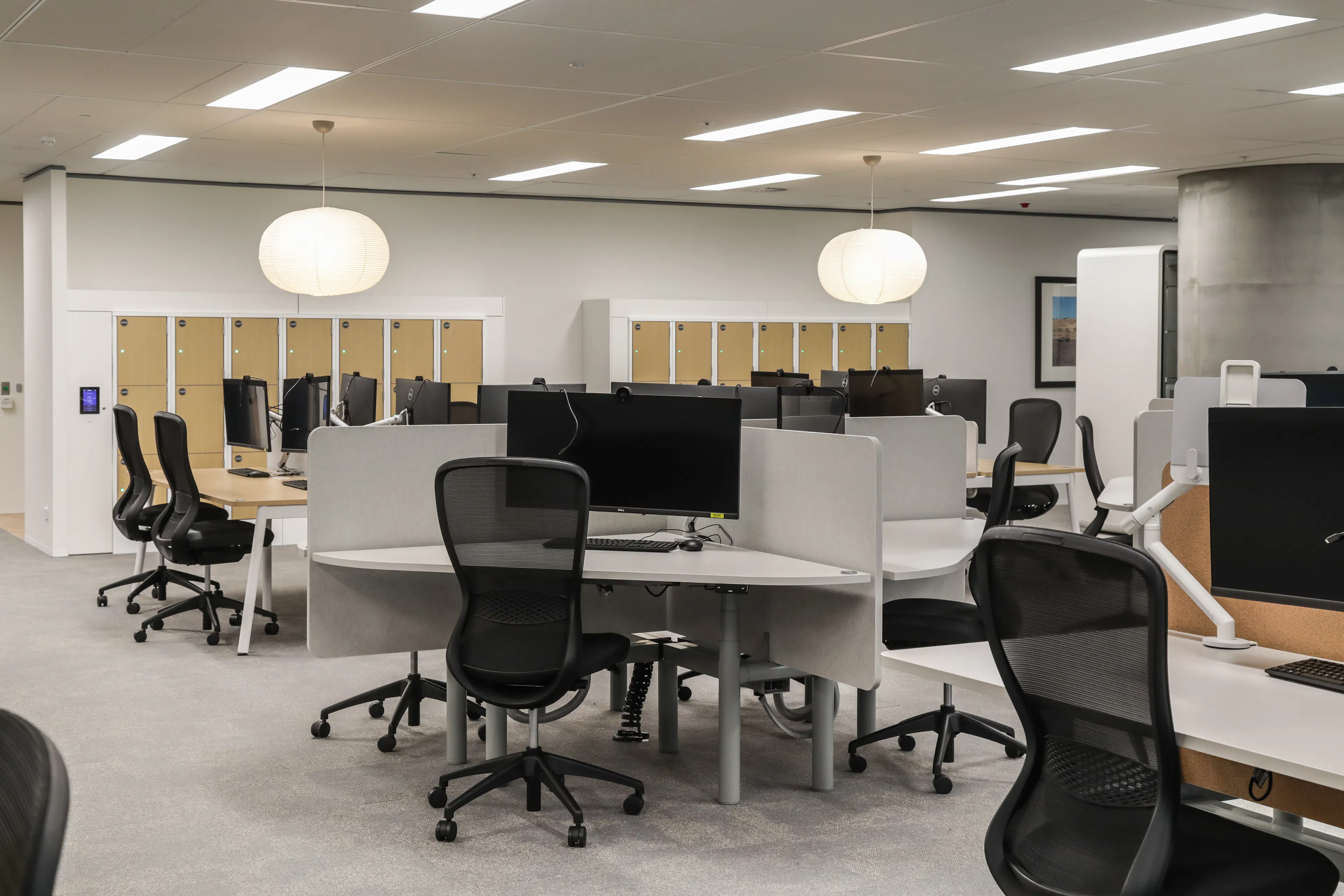 contemporary corporate interior office with task chairs and workstations