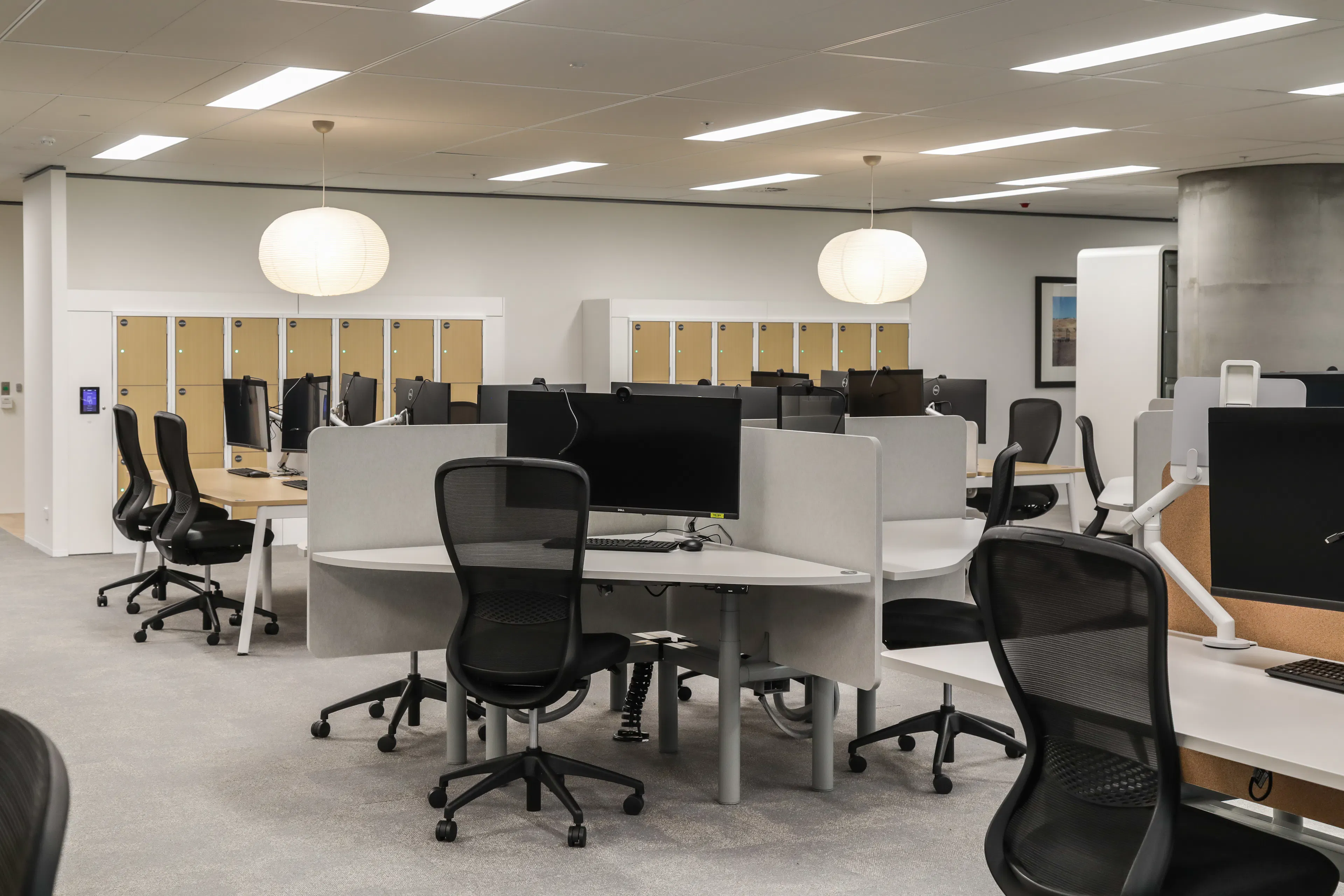 contemporary corporate interior office with task chairs and workstations 