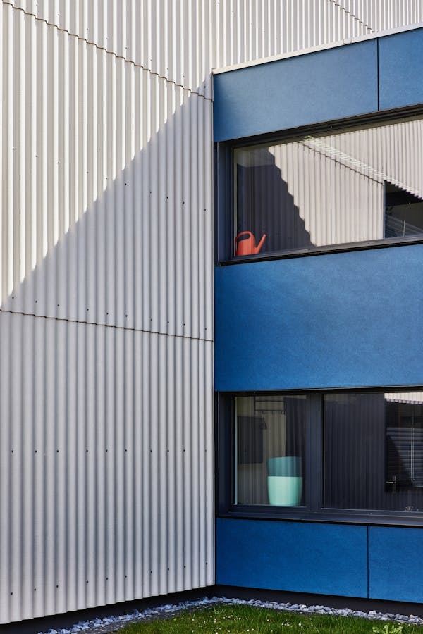 corner of two different eternit facades