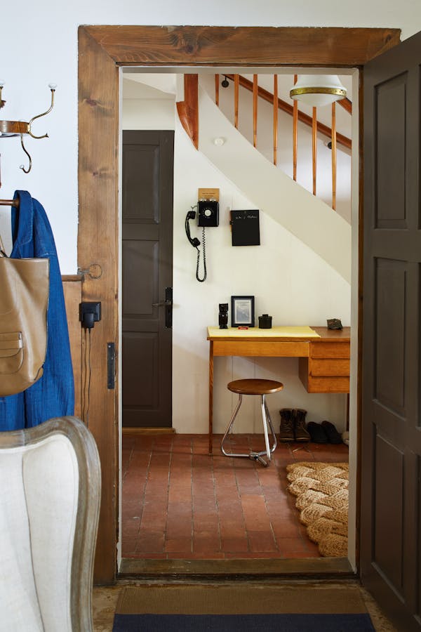 Entrance hall and staircase with a desk from the 1950s