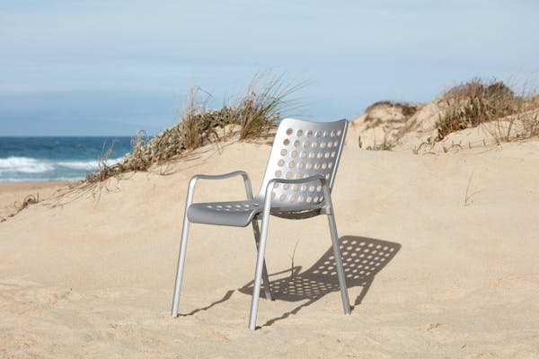 Landi chair by Hans Coray on the beach in the sun