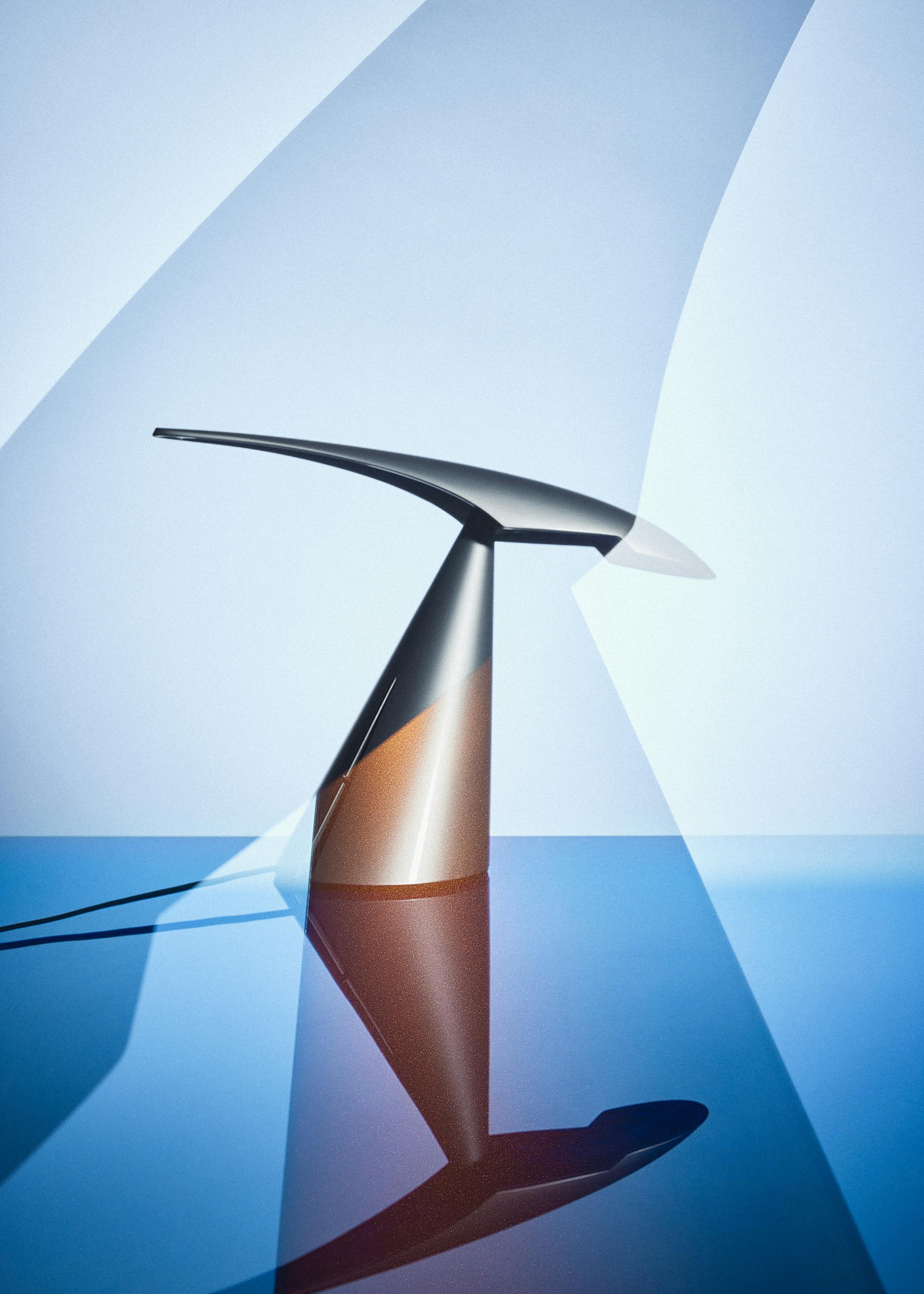 Multiple analogue exposure of the lamp Ran by german designer Peter Naumann in front of a vibrant blue background