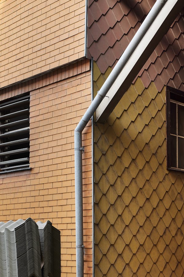 an orange eternit faCade from the 19th century