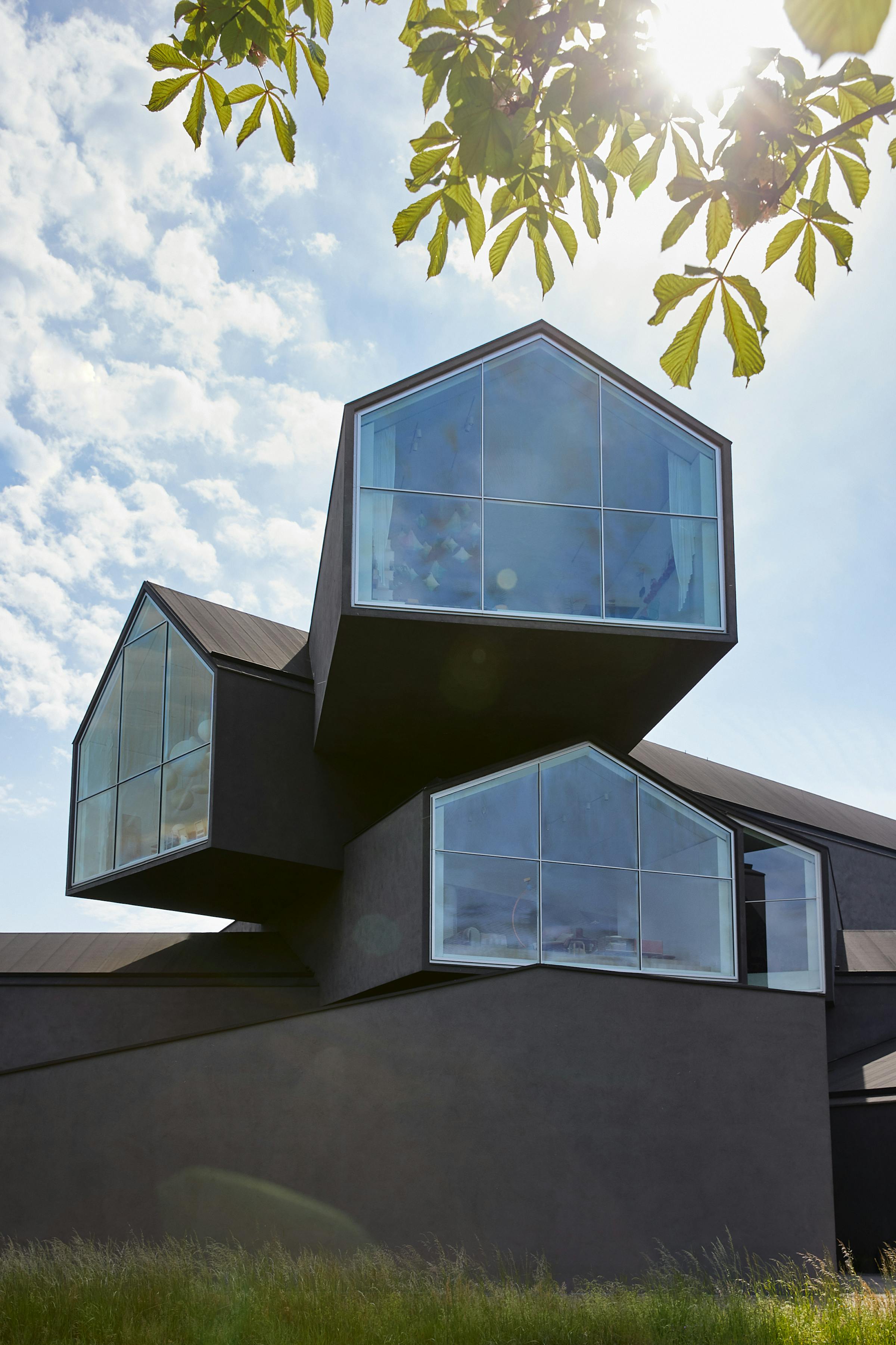 Architectural detail of the Vitra House against a blue sky