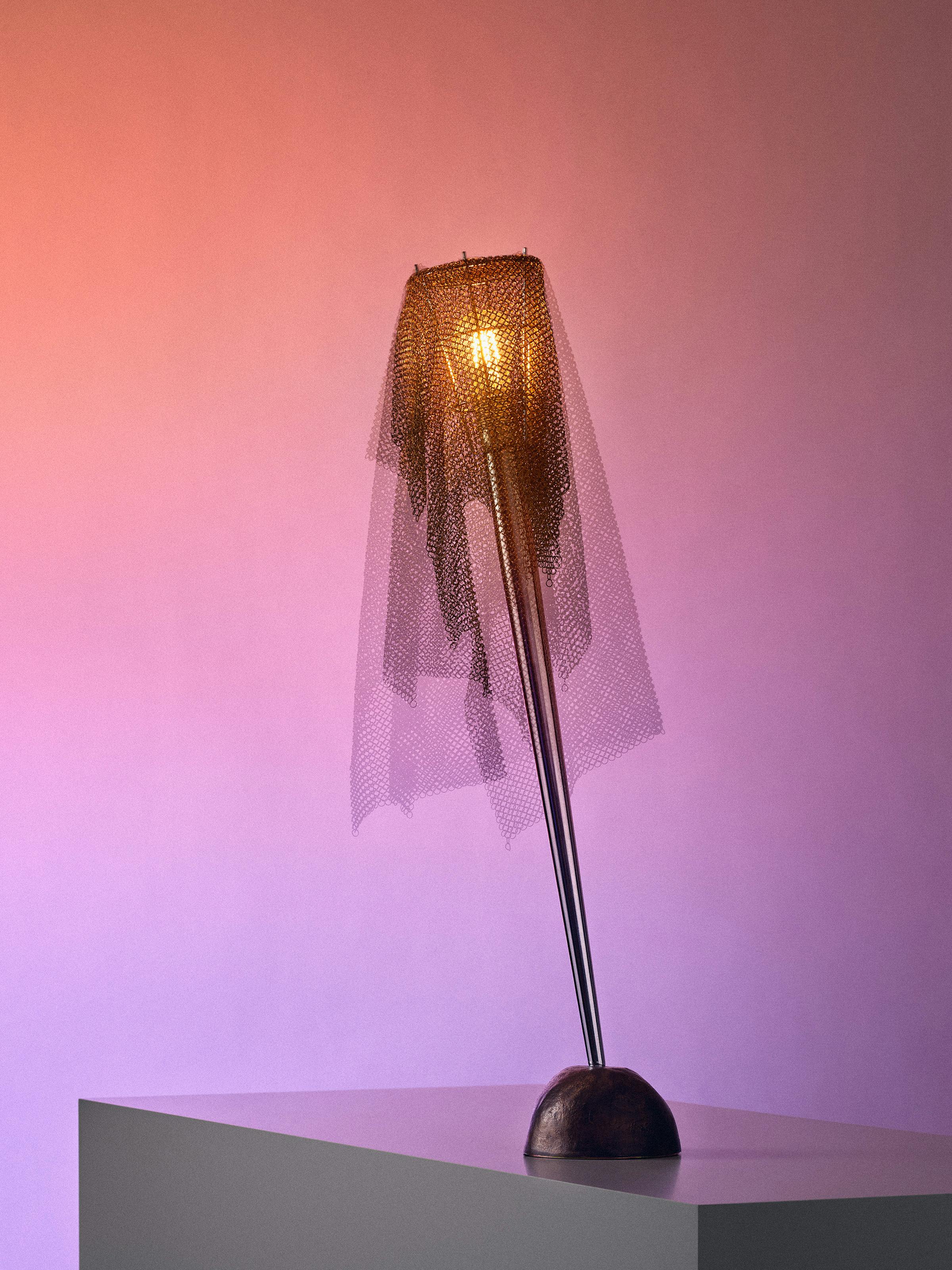 Multiple analoge exposure of the lamp "Ecate" by Italian designer Toni Cordero in front of a pastel colored background