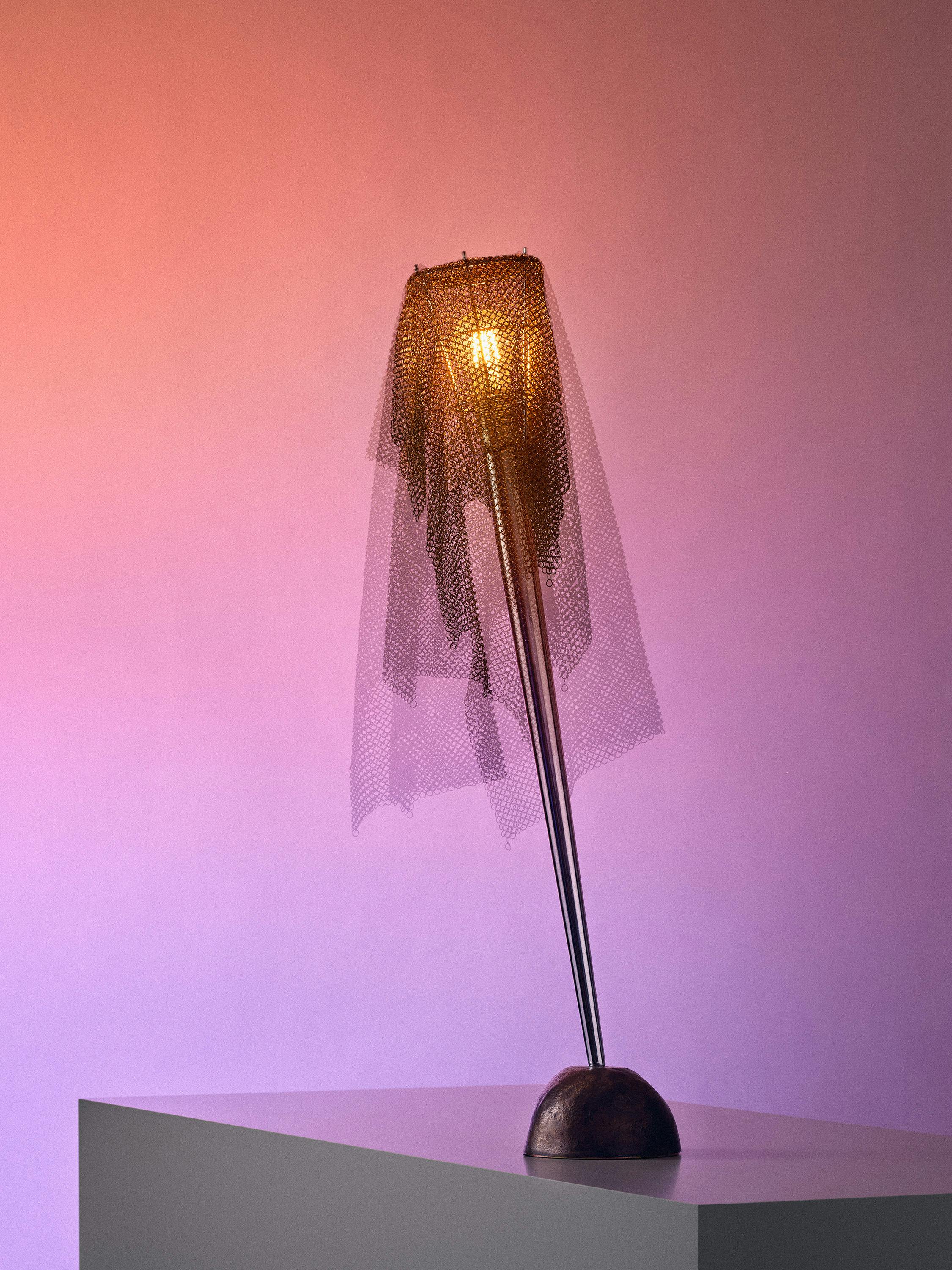 Multiple analoge exposure of the lamp "Ecate" by Italian designer Toni Cordero in front of a pastel colored background