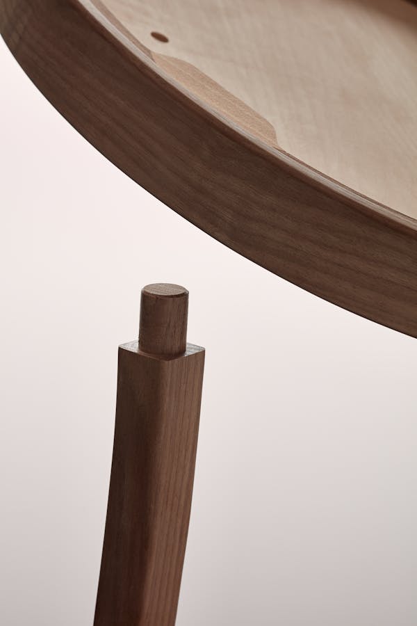 Detailed shot of a wooden seat shell from the Seley armchair by Frédéric Dedelley for HorgenGlarus