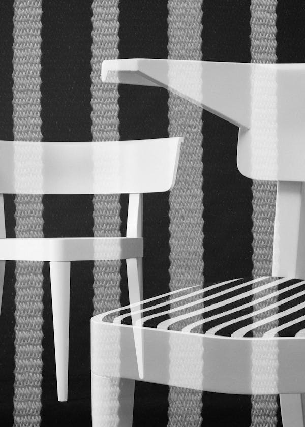 Multiple analoge exposure in of the chair "B1" by German designer Stefan Wewekra in front of a bold black background