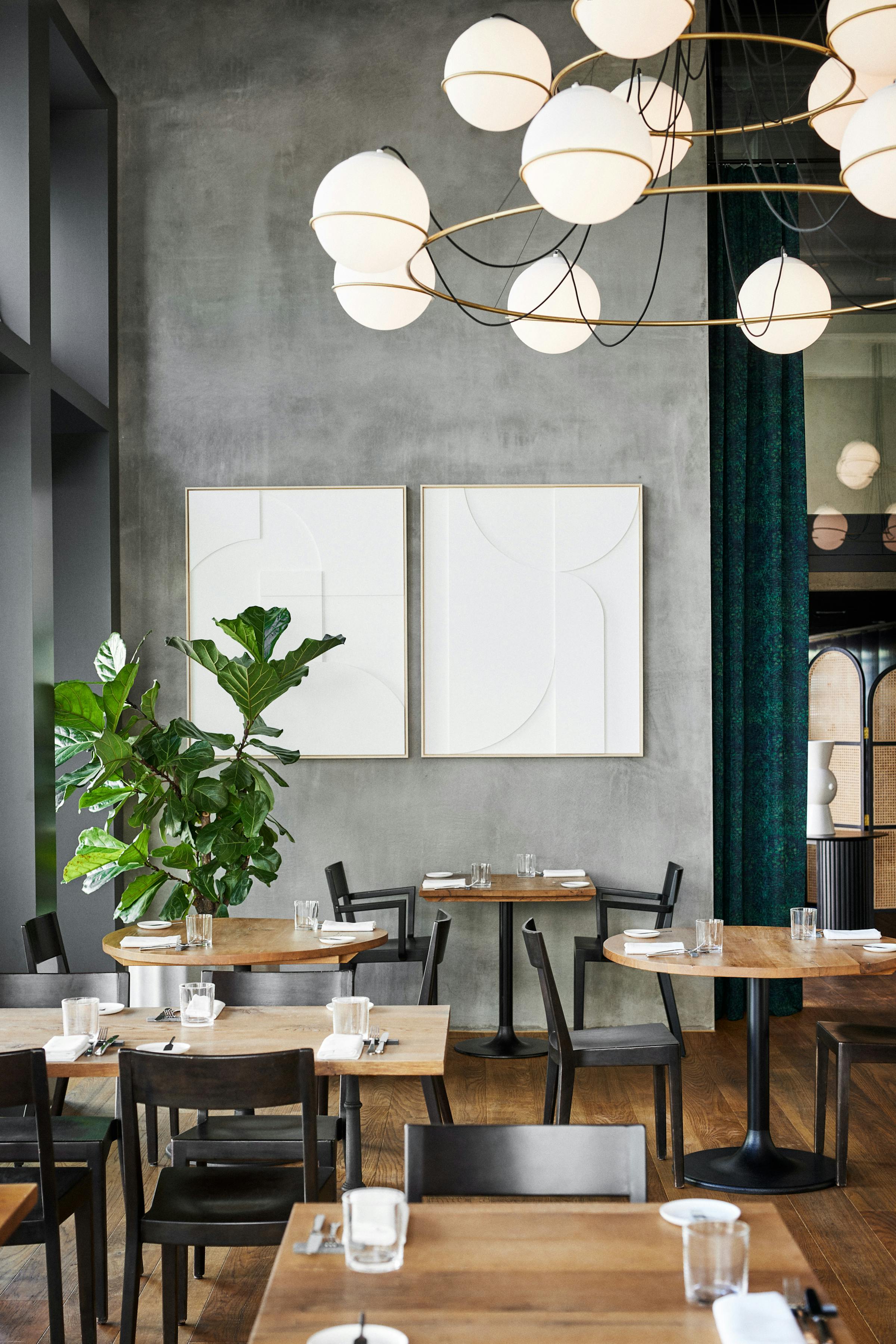 Eating space with many tables in the restaurant Anna during daytime