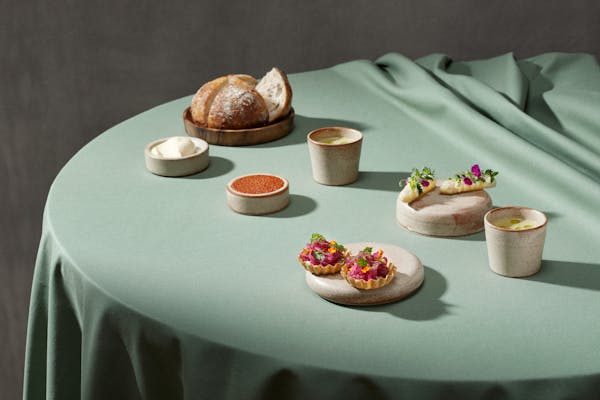 Variety of amuse bouches on a green table cloth