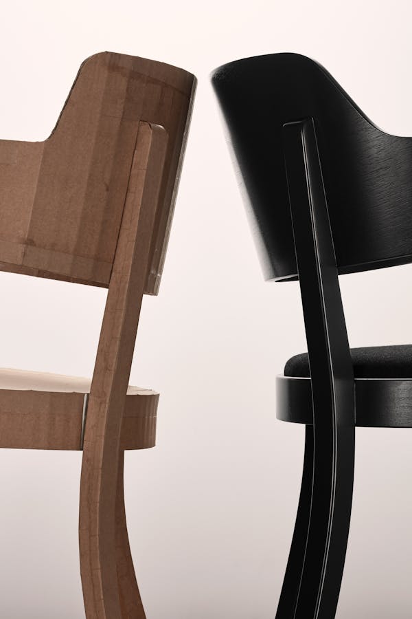 A prototype made of cardboard and a final version of the Seley armchair by Frédéric Dedelley for HorgenGlarus