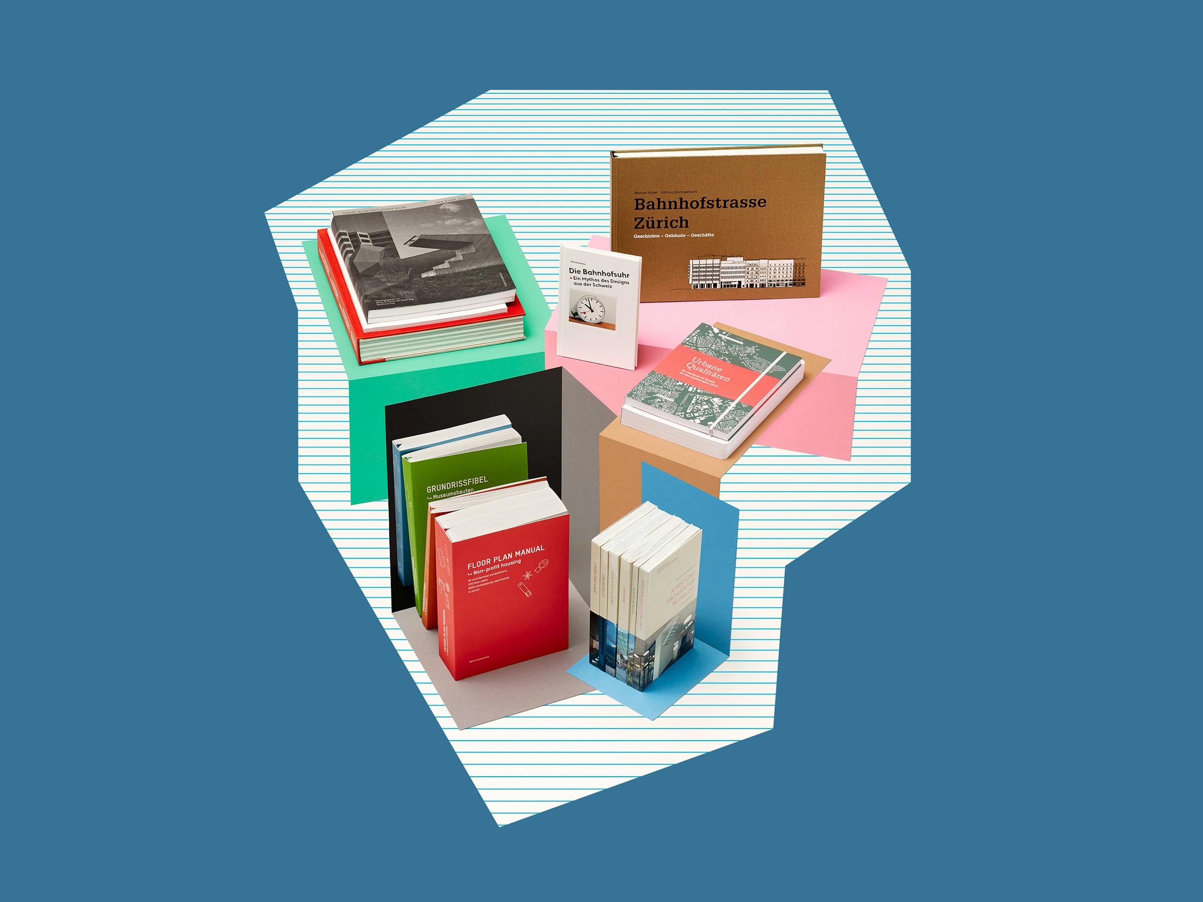 A group of architecture books on a striped paper background