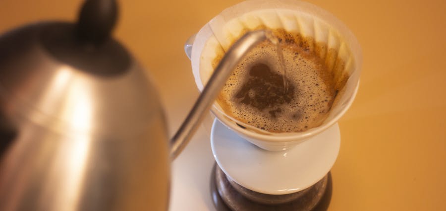 Water being poured in to Coffee filter
