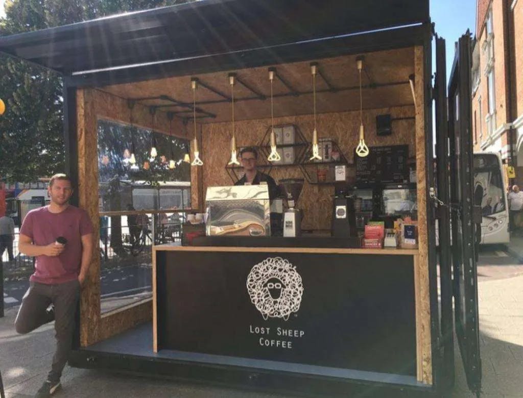 Stuart outside Lost Sheep Coffee stand in Canterbury