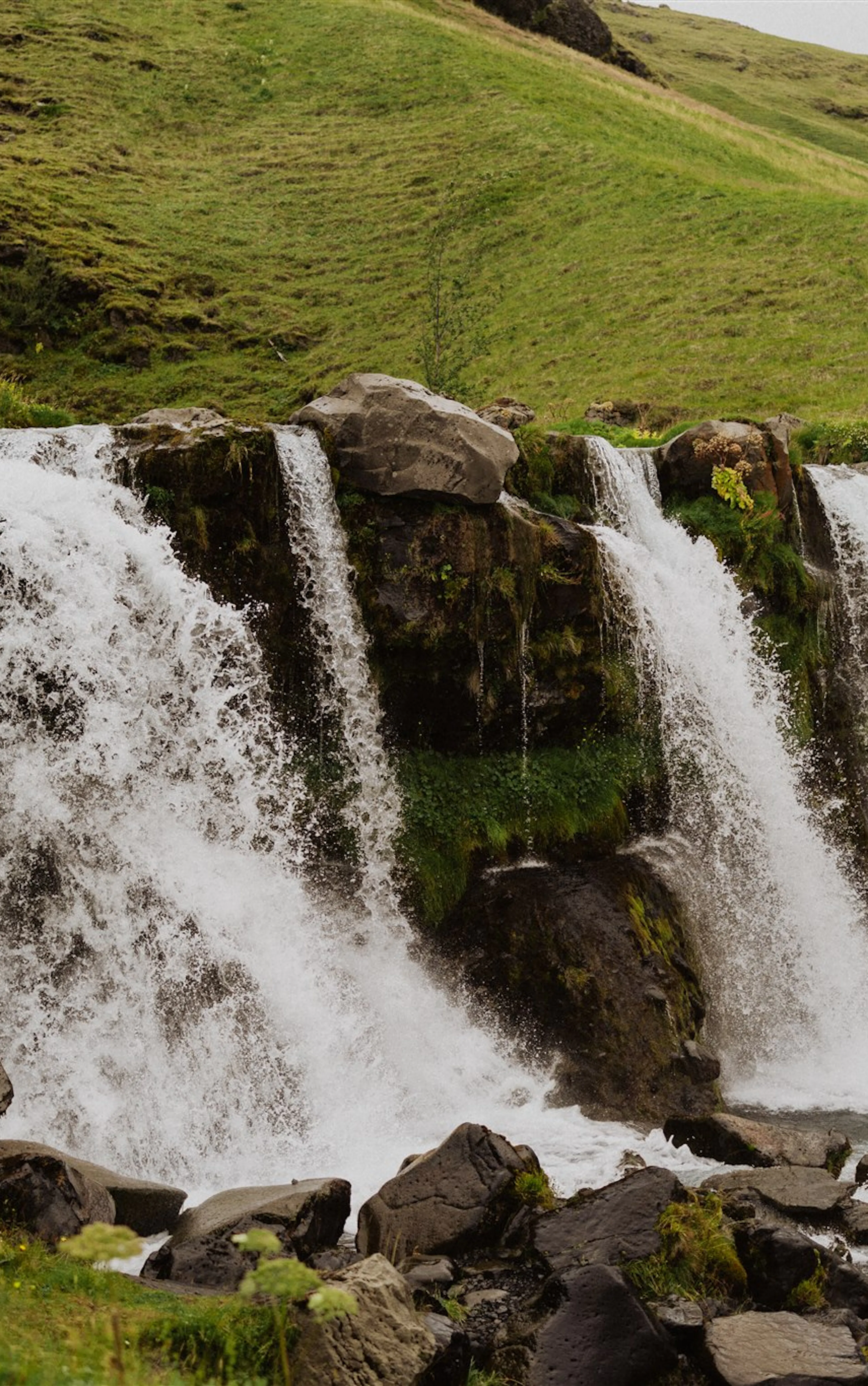 Waterfall green cliffs
