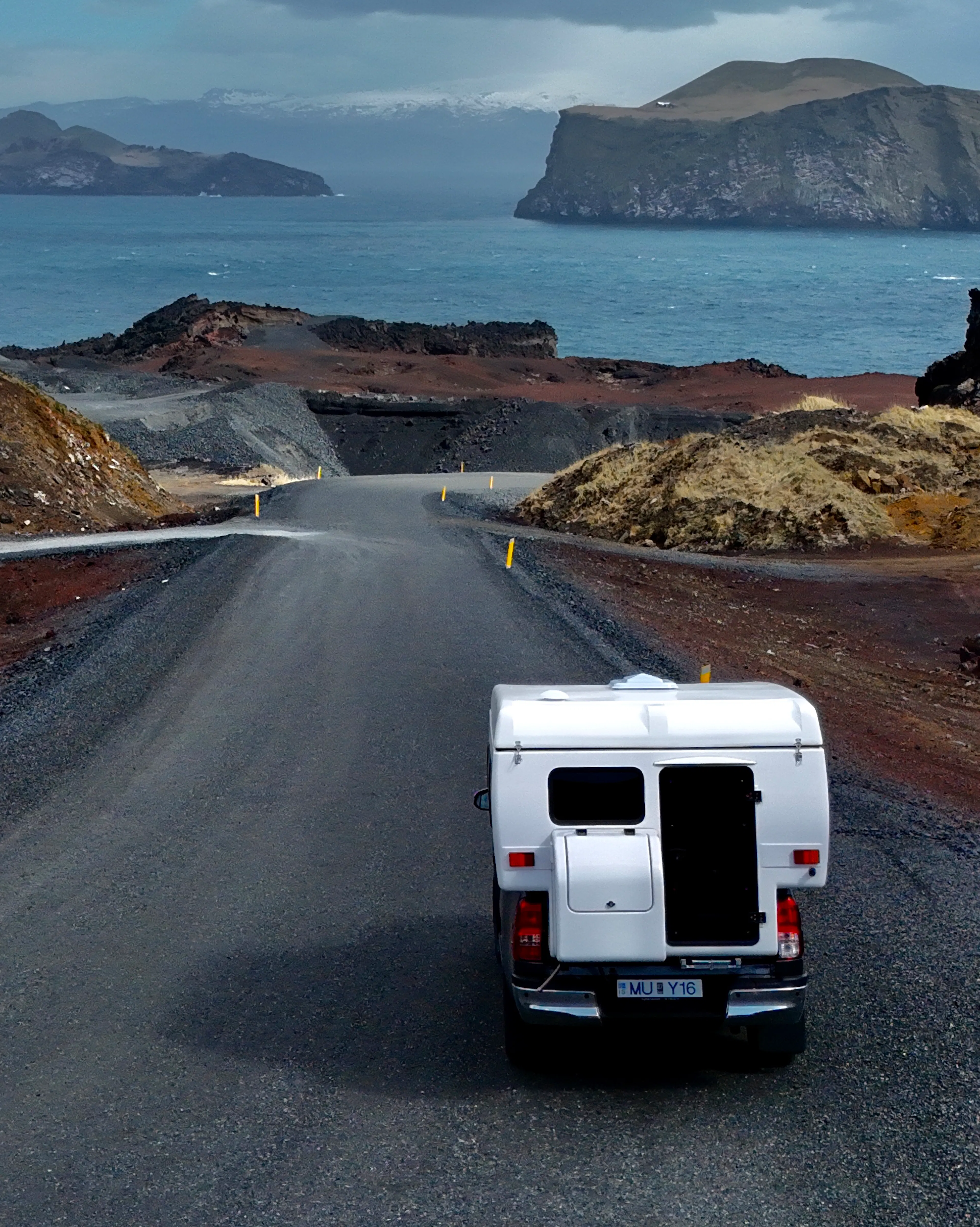 Camper van coastal road aerial