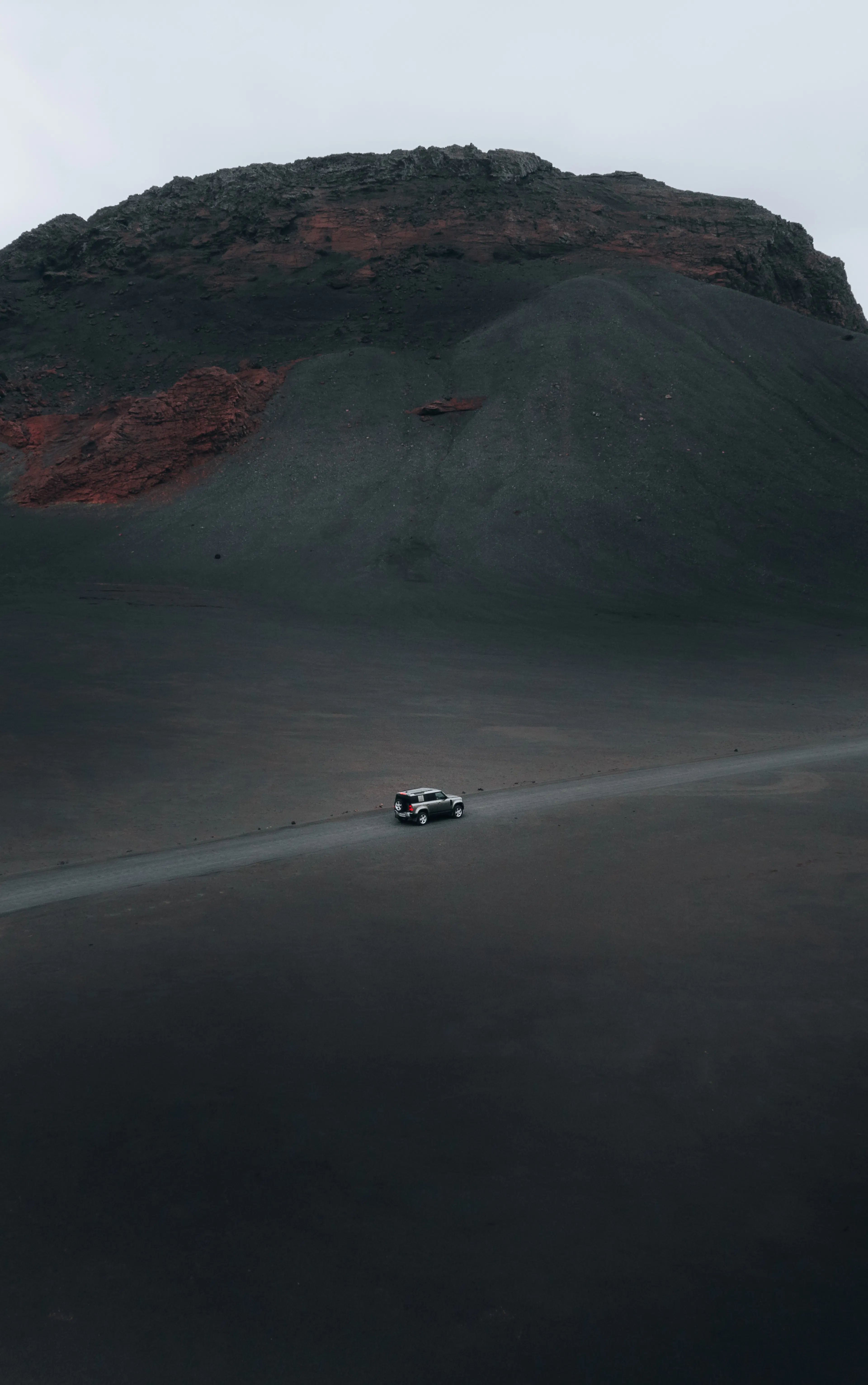 Suv black volcanic landscape aerial