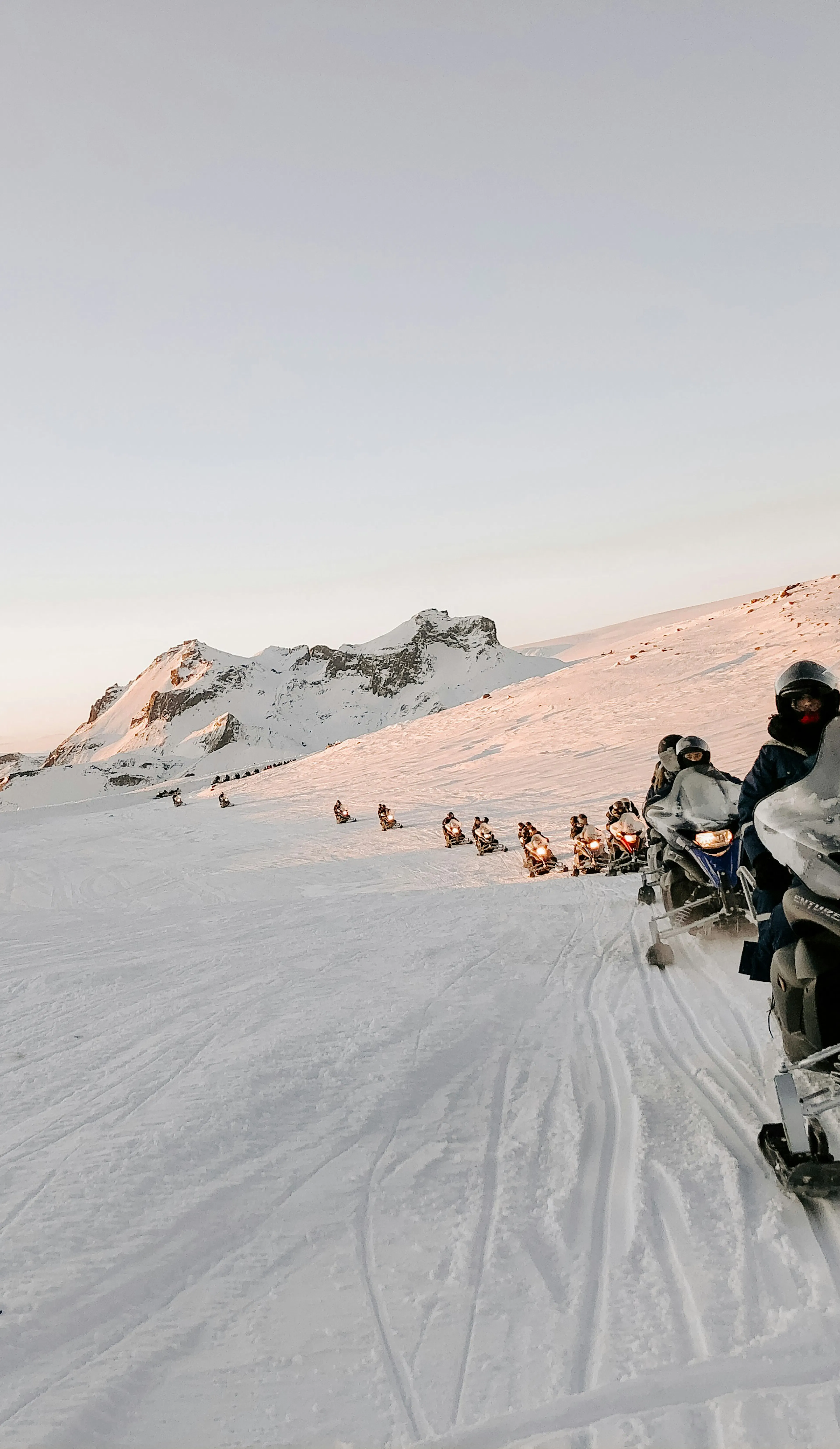 Snowmobile tour glacier sunset