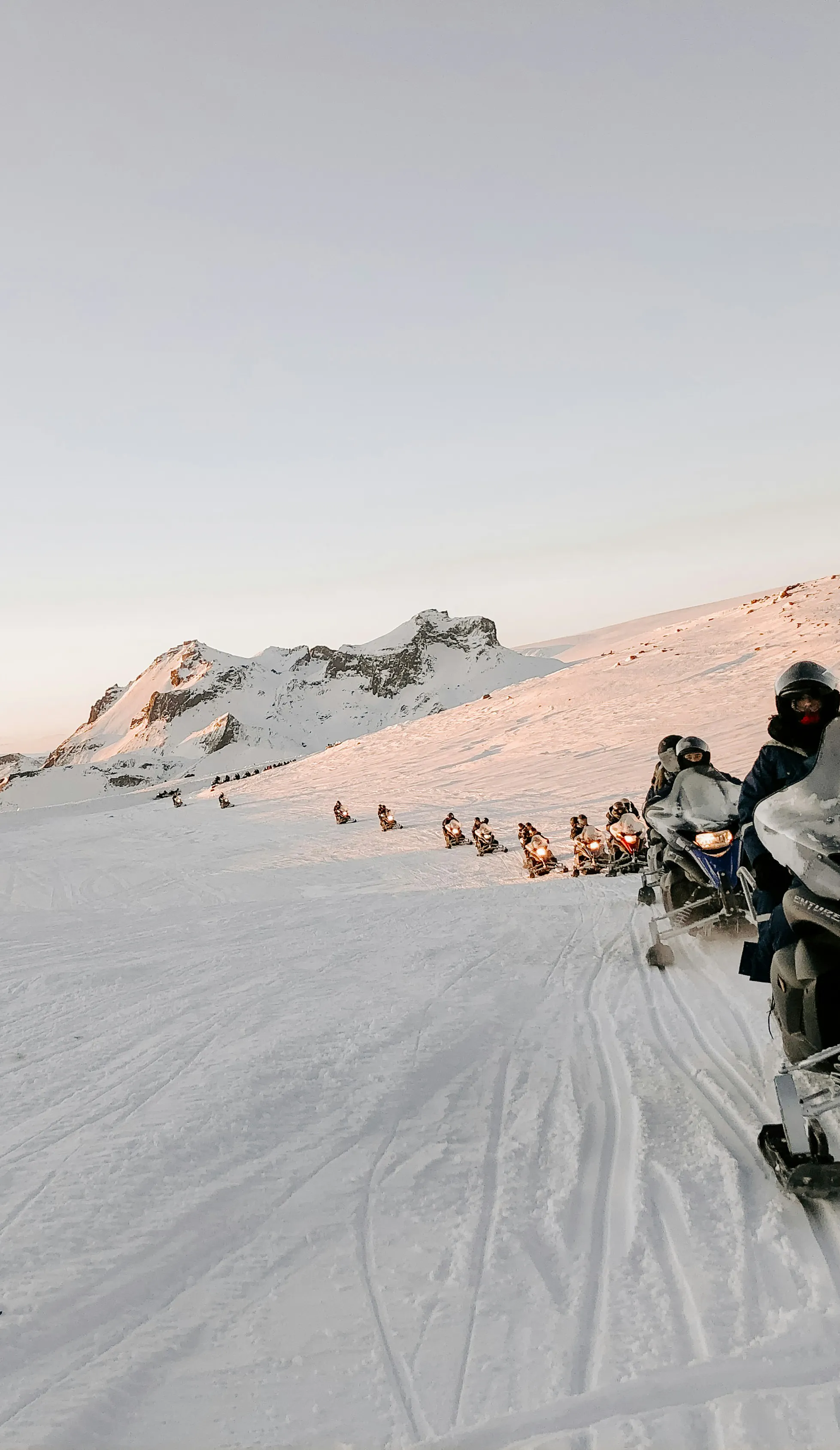 Snowmobile tour glacier sunset
