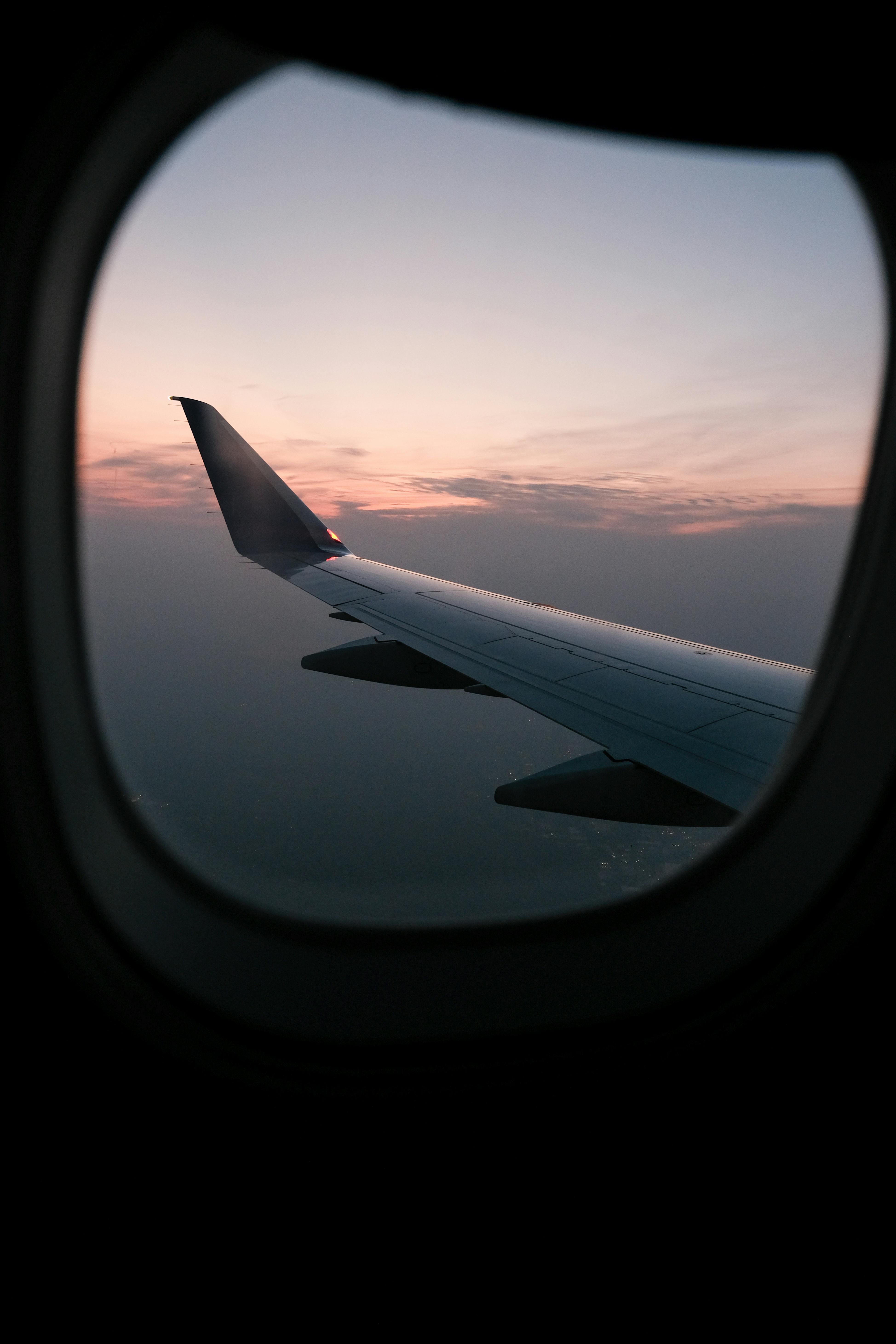 Airplane window sunset