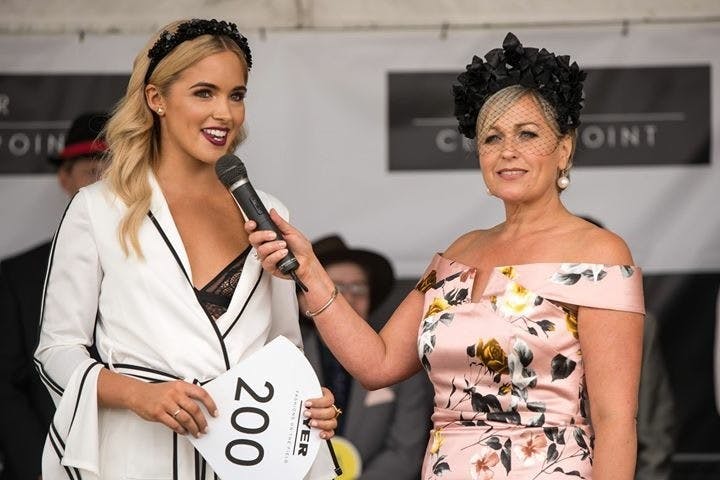 Louise Arnold with mic at Myer Fashions On the Field