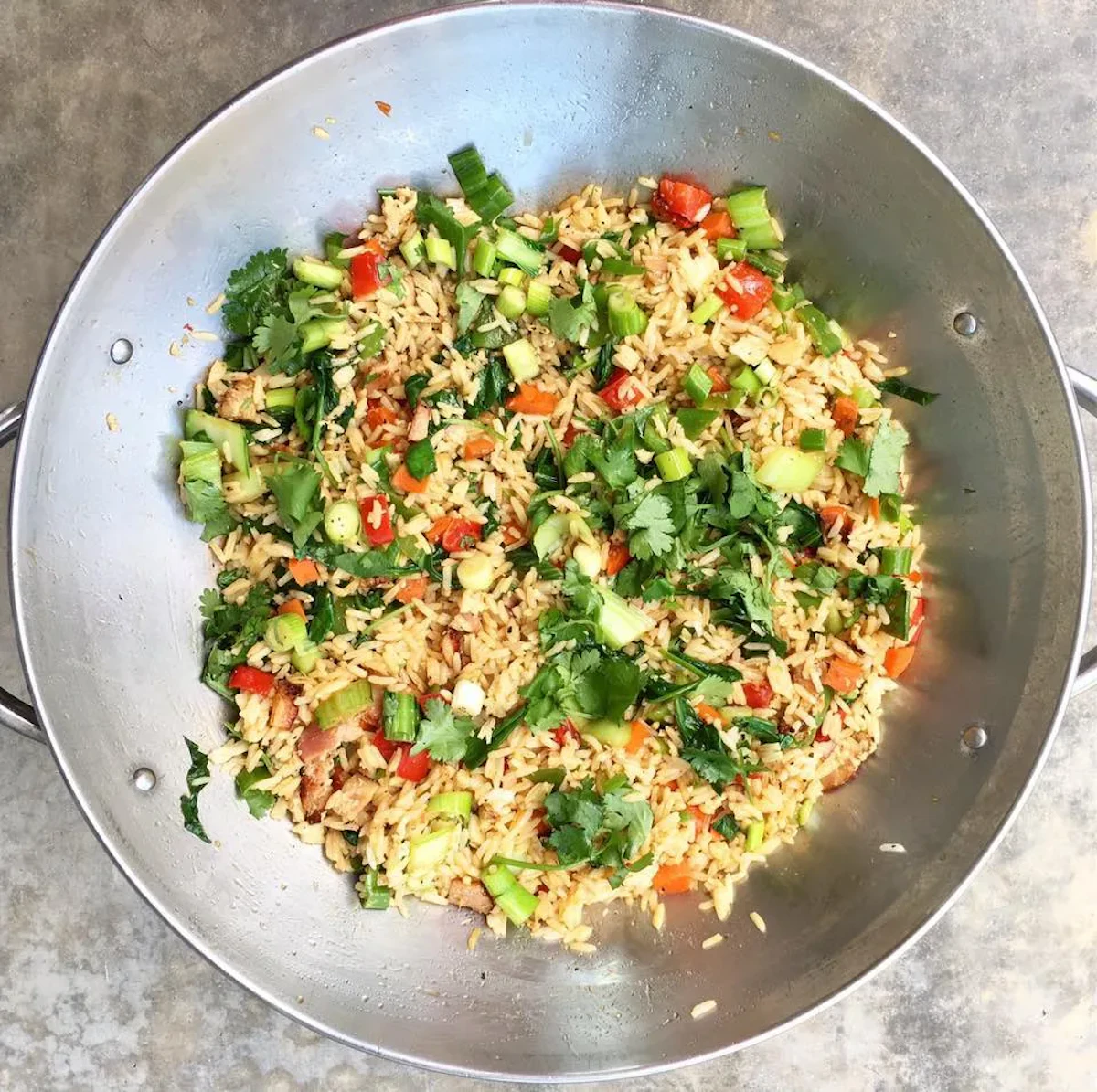 Chicken fried rice in a bowl from above.