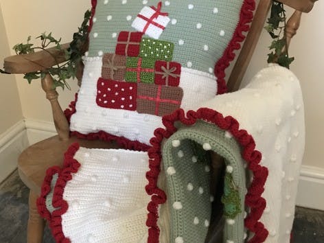 Cosy crochet Christmas cushion
