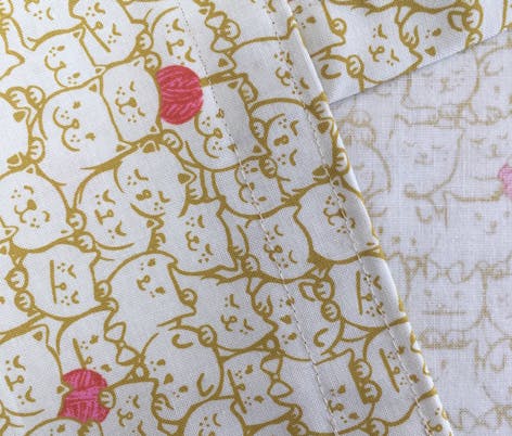 Sewing a smooth hem to your tote bag.