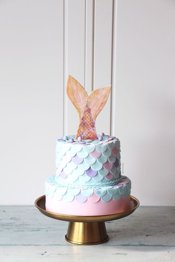A unicorn mermaid cake for my daughter's 5th birthday : r/cakedecorating