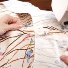 Stitch waistband and skirt together
