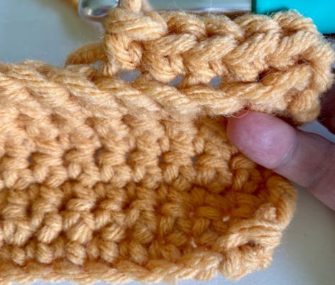 Working back loops of crochet pumpkin