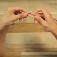 how to cast on - bring right needle in front
