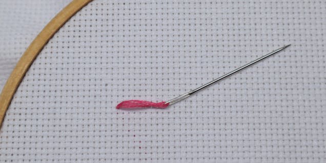 Needle working into aida fabric