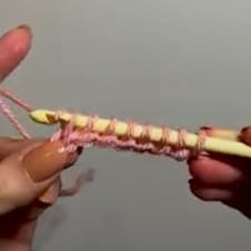 Yarn over and pull through first loop
