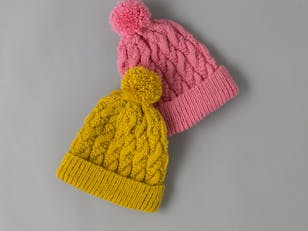 Modern Cable Hat - Free Knitting Pattern for Women in Paintbox Yarns Simply Aran by Paintbox Yarns