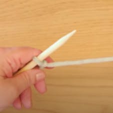 Secure slip knot around needle