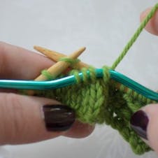 Cable knitting step 11